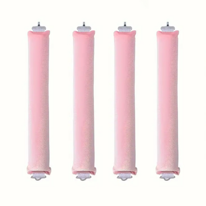 Vier rosa Wasserfilterkartuschen, zylindrisch, für Trinkwasseraufbereitung, umweltfreundlich.
