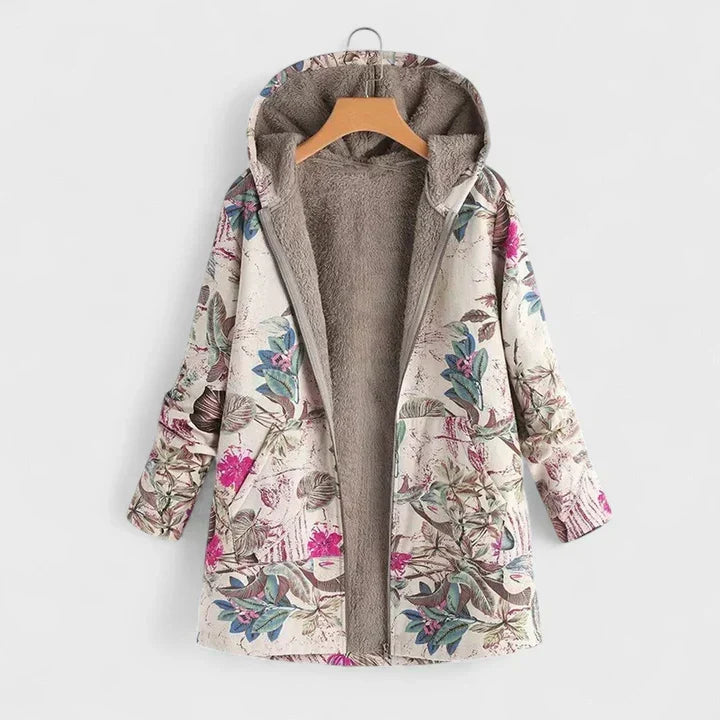 Parkas på galge med rosa och blågröna blommor på ljus botten, öppen med mjukt fleecefoder 2