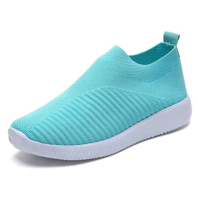 Grüner Sneaker aus Mesh, rutschfeste Sohle, atmungsaktiv, ideal für Sport und Freizeit.
