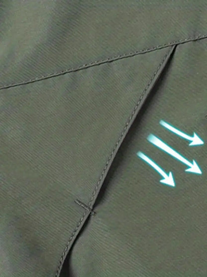 Grüne Outdoor-Jacke, wind- und wasserdicht, Detailansicht, atmungsaktiv, funktional.