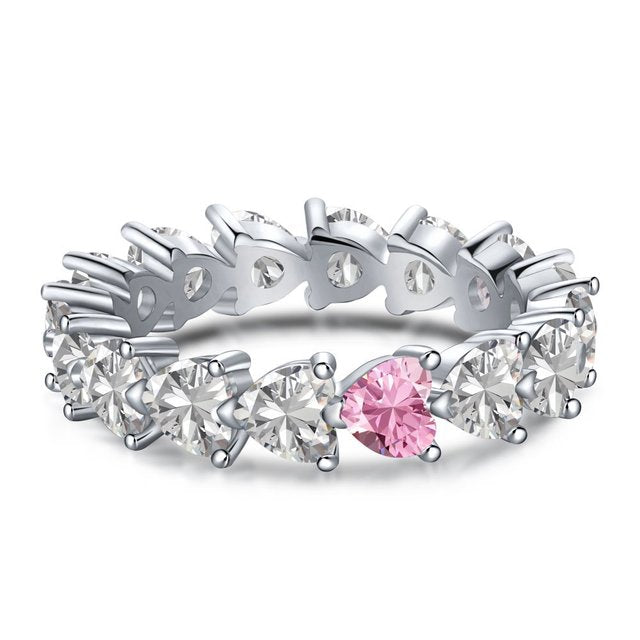 Silberring mit rosa Saphir und Diamanten, Ehering, elegantes Schmuckdesign.
