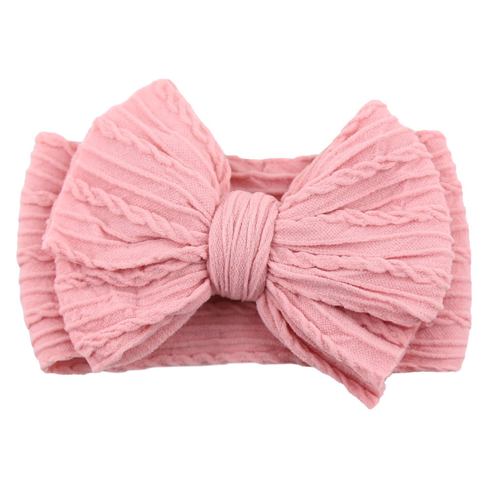 Rosa Baby-Stirnband aus Baumwolle mit Schleife, gestrickt, modisches Accessoire für Mädchen.