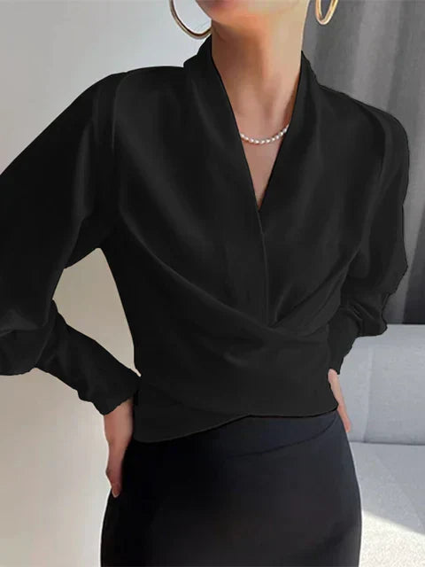 Elegante schwarze Damenbluse mit V-Ausschnitt, langen Puffärmeln, tailliert, 2023 Mode.
