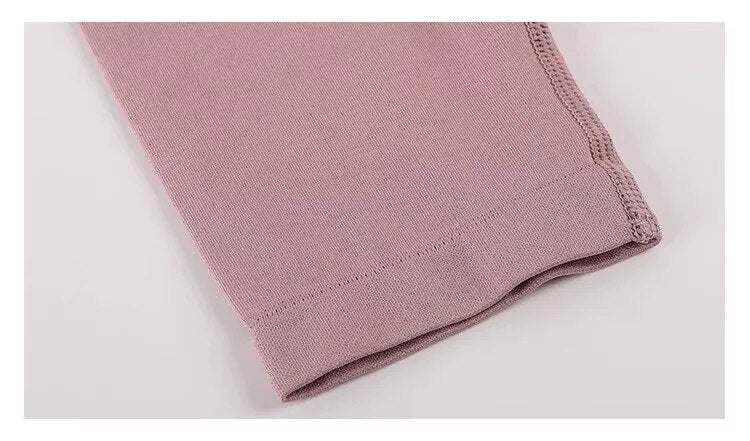 Rosa Strickstoff, Nahaufnahme, weiches Material, Textil, Mode, Detailansicht, Stoffstruktur.