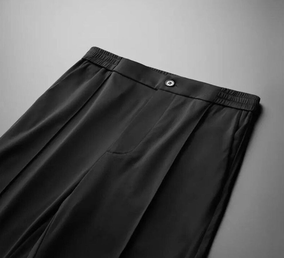 Schwarze Herren-Anzughose, elastischer Bund, elegantes Design, hochwertige Herrenmode.