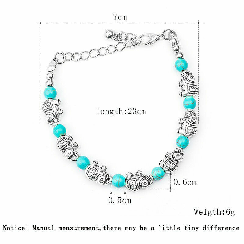 Silbernes Armband mit türkisfarbenen Perlen und Fischanhängern, Länge 23 cm, Damen-Schmuck.