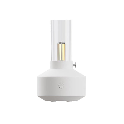 Weißer Aromatherapie-Diffuser mit LED-Kerzenlicht, modernes Design, Raumduftgerät.