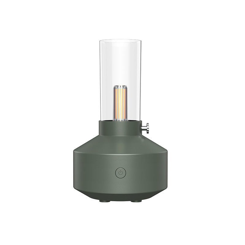 Grüner Aromatherapie-Diffuser mit LED-Kerzenlicht, Nachtlichtfunktion, modernes Design.