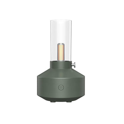 Grüner Aromatherapie-Diffuser mit LED-Kerzenlicht, Nachtlichtfunktion, modernes Design.