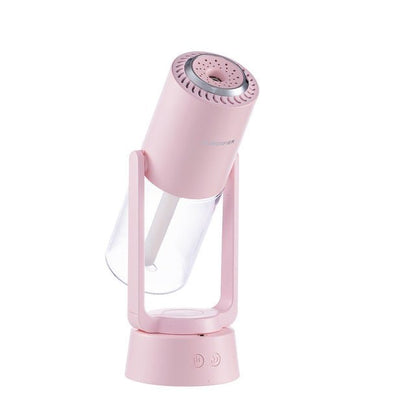 Rosa automatischer rotierender Luftbefeuchter, modernes Design, tragbar, leise.