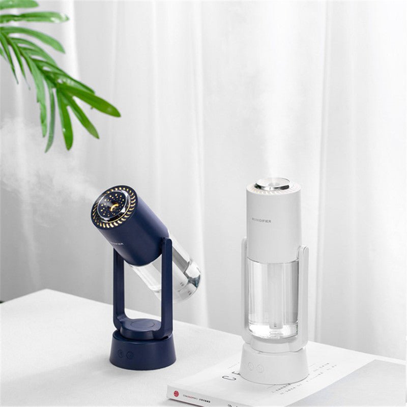 Automatischer rotierender Luftbefeuchter, blau und weiß, modernes Design, Tischgerät.