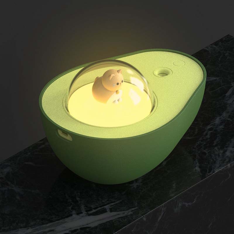 Grüner Avocado Mini Luftbefeuchter mit LED-Licht und Katzenfigur, dekorativ und funktional.