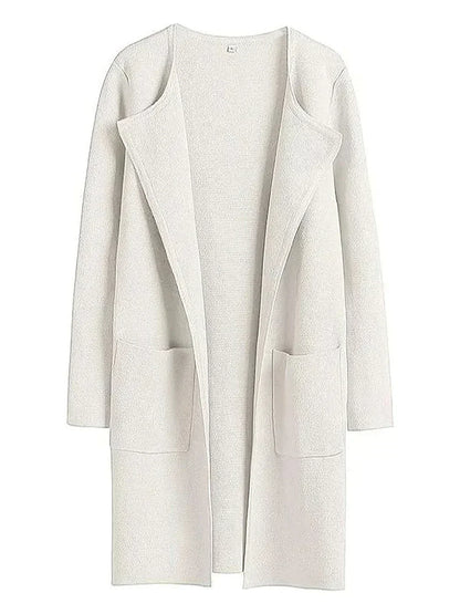 Damen Strickjacke beige, offener Schnitt, lange Ärmel, Taschen, weiches Material, modisch.