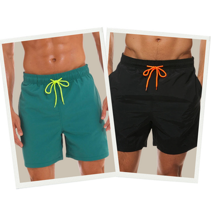 Zwei Herren-Badeshorts, grün mit gelbem Band, schwarz mit orangefarbenem Band, Sommermode.