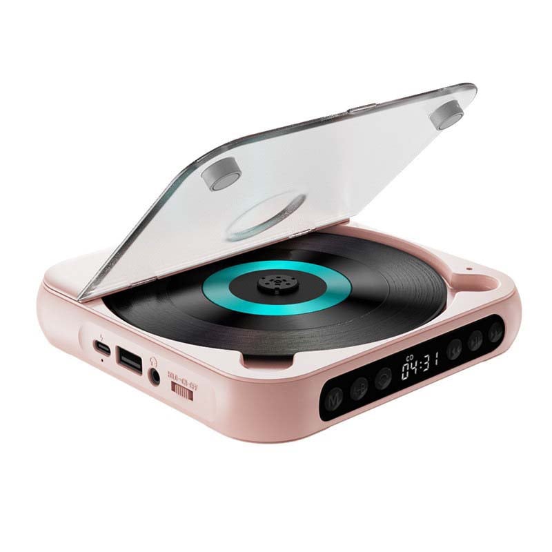 Rosa CD-spelare med öppet lock och turkost skivcentrum, sedd snett framifrån med USB-C, USB-port och knappar synliga. 14