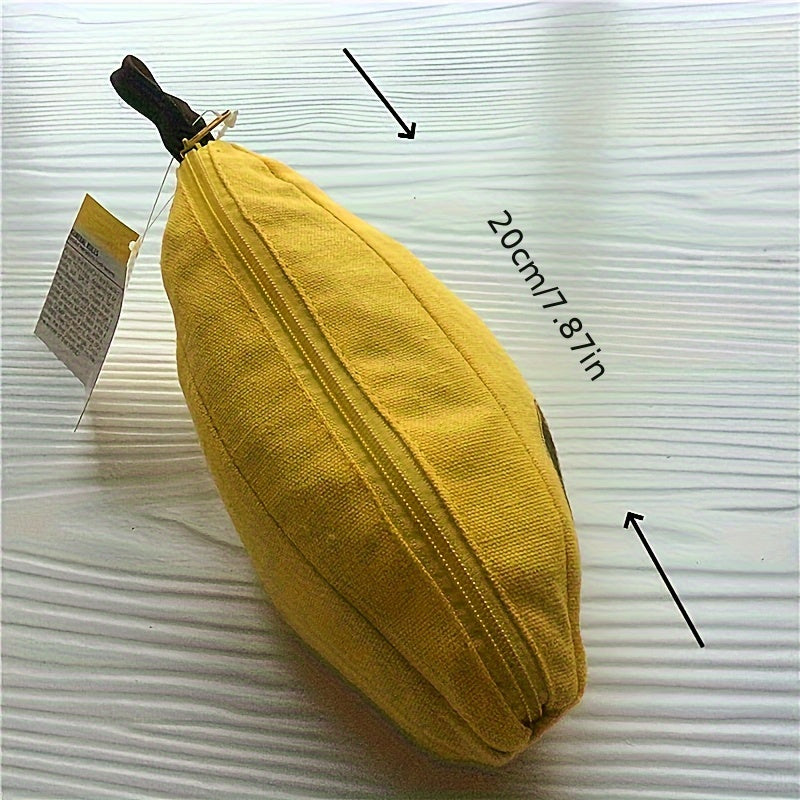 Gelbes Bananen-Etui aus Stoff mit Reißverschluss, 20 cm lang, auf weißem Hintergrund.