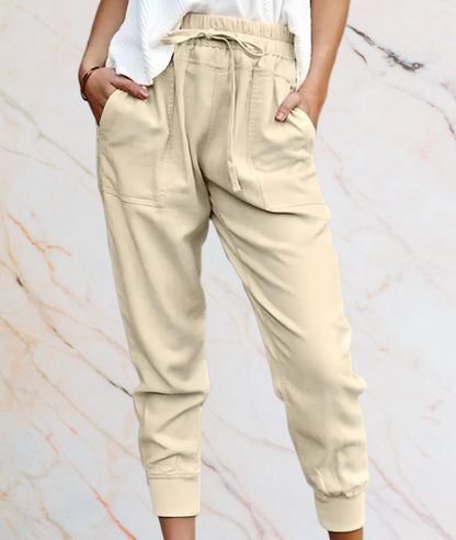 Beige Damen Jogginghose, Baumwolle, elastischer Bund, Taschen, lässig, bequem, modisch.