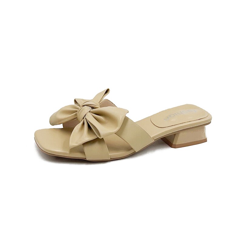 Beige Damensandale mit Schleife, Blockabsatz, Sommermode, elegantes Design.