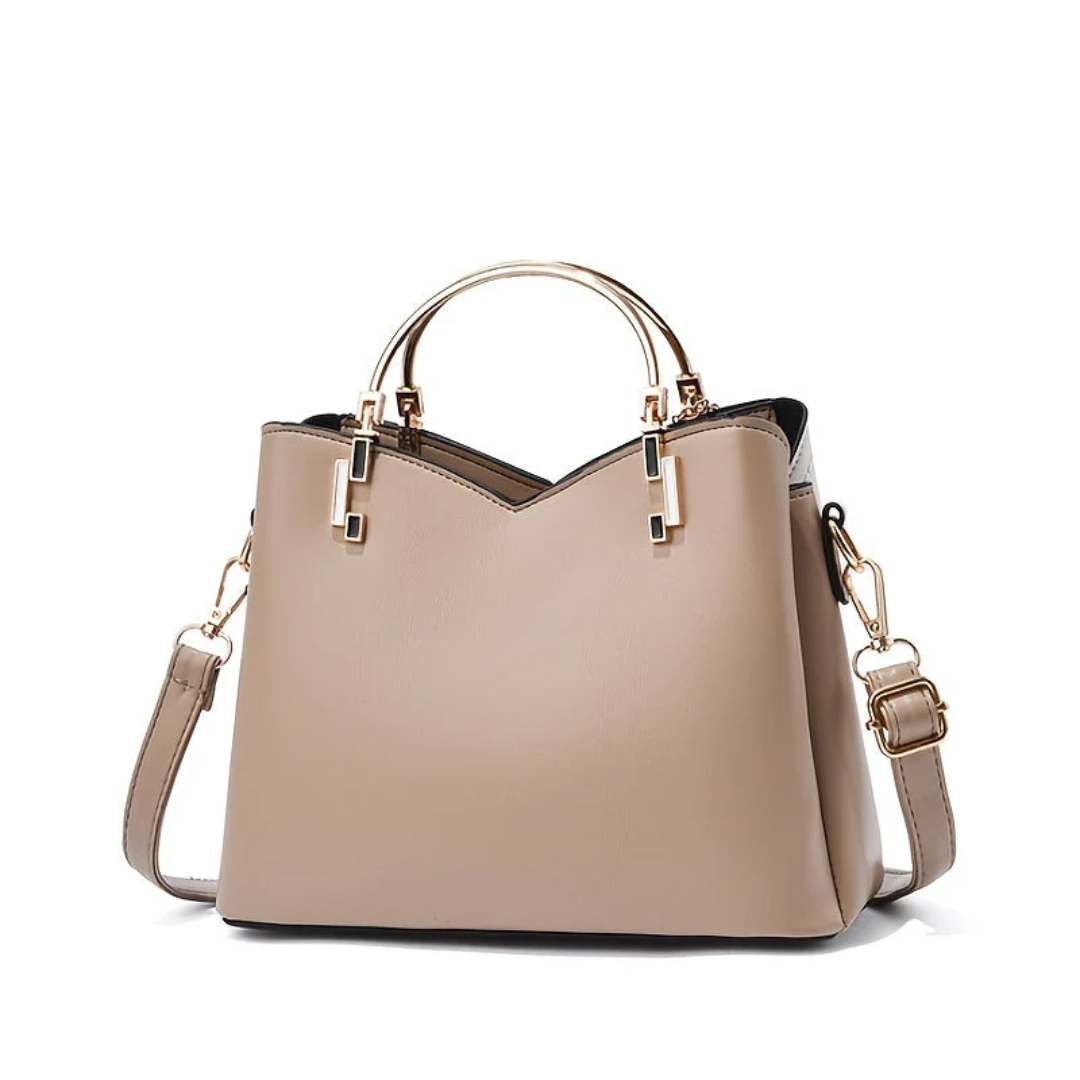 Beige Damenhandtasche aus Leder mit goldenen Griffen und abnehmbarem Schulterriemen.
