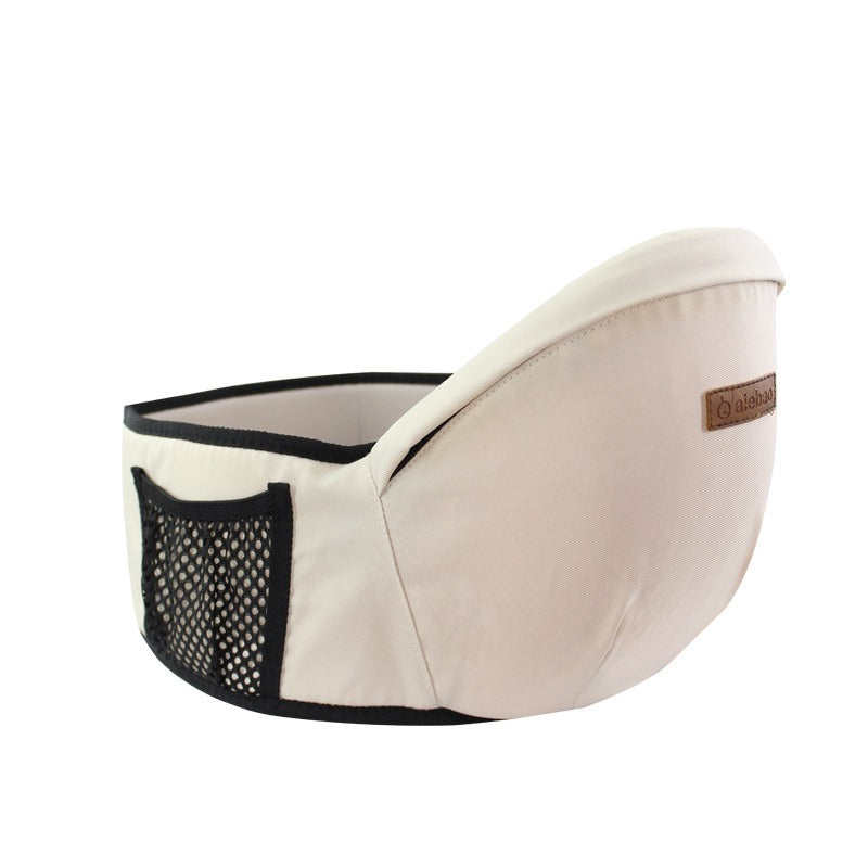 Beige Babytrage aus Baumwolle mit Netzseitentasche, ergonomisch, für Kleinkinder.