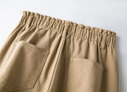 Beige Damenhose mit elastischem Bund, Baumwolle, zwei Gesäßtaschen, lässiger Stil.