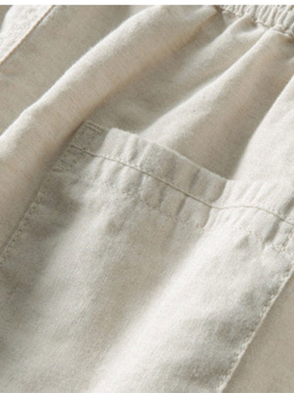 Beige Leinenhose mit elastischem Bund und Tasche, ideal für Sommermode und Freizeitkleidung.