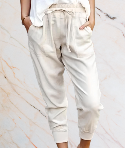 Damen Jogginghose beige, bequem, Kordelzug, Taschen, Freizeitmode, Baumwolle, lässig.