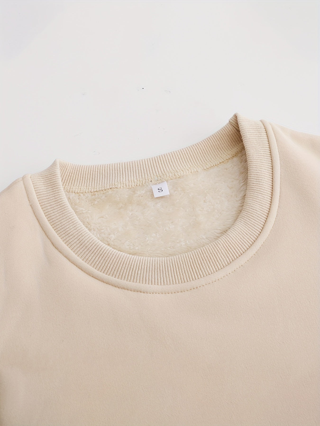 Beiges Sweatshirt aus Baumwolle, Rundhalsausschnitt, weiches Innenfutter, Größe S.