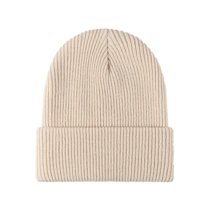 Beige Strickmütze aus Wolle, unisex, warm, modisch, ideal für Herbst und Winter.