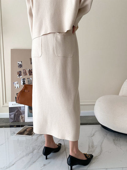 Damen Strickrock beige, knielang, mit Taschen, elegantes Design, Herbstmode, Büro-Outfit.
