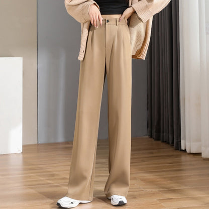 Beige Damenhose, weites Bein, eleganter Stil, Herbstmode, aus Baumwolle, für Büro und Freizeit.