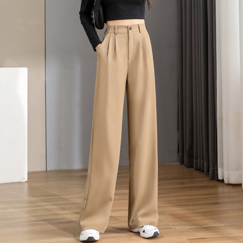 Damenhose beige, weit geschnitten, elegant, aus Baumwolle, modisch, für Büro und Freizeit.