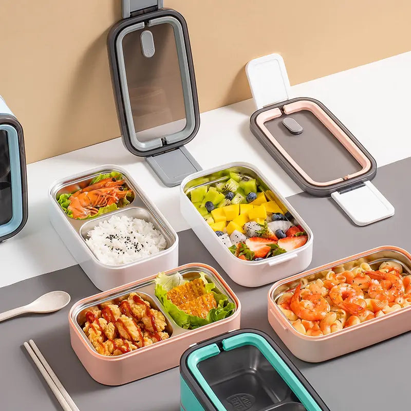 Edelstahl-Bento-Box mit Fächern, ideal für Mahlzeiten unterwegs, in verschiedenen Farben.