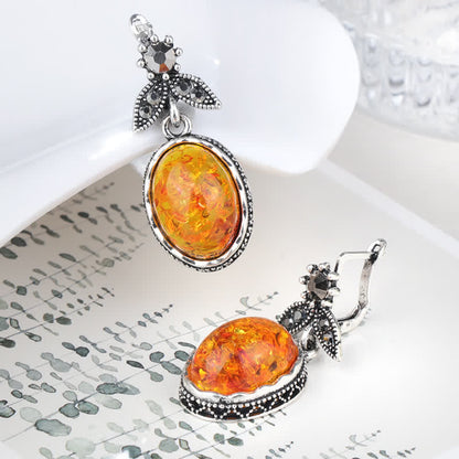 Silberne Ohrringe mit Bernstein, oval, Vintage-Stil, Damen-Schmuck, elegantes Design.