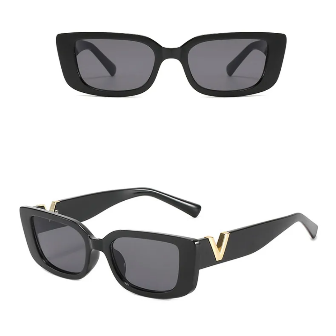 Schwarze rechteckige Sonnenbrille mit goldenen Details, UV-Schutz, modisches Accessoire.