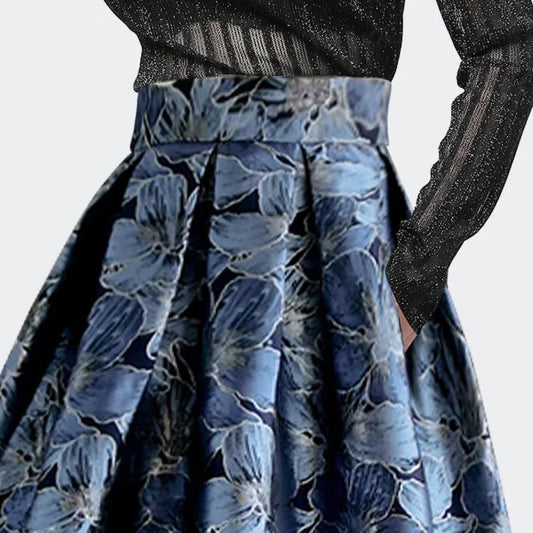Damenrock blau geblümt, hoher Bund, elegantes Design, ideal für festliche Anlässe.