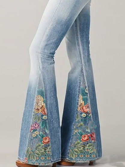 Damen Schlaghose, hellblau, Blumenstickerei, Vintage-Stil, Denim, modisch, 70er Jahre Retro-Look.