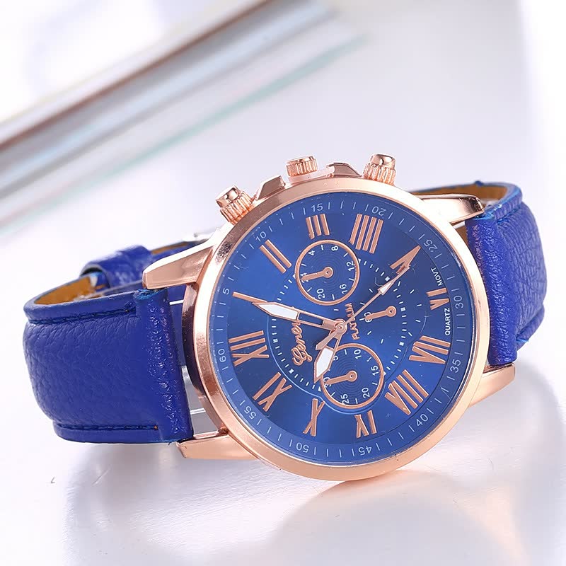 Luxus Herrenarmbanduhr, blaues Lederarmband, roségoldenes Gehäuse, römische Ziffern, Chronograph.