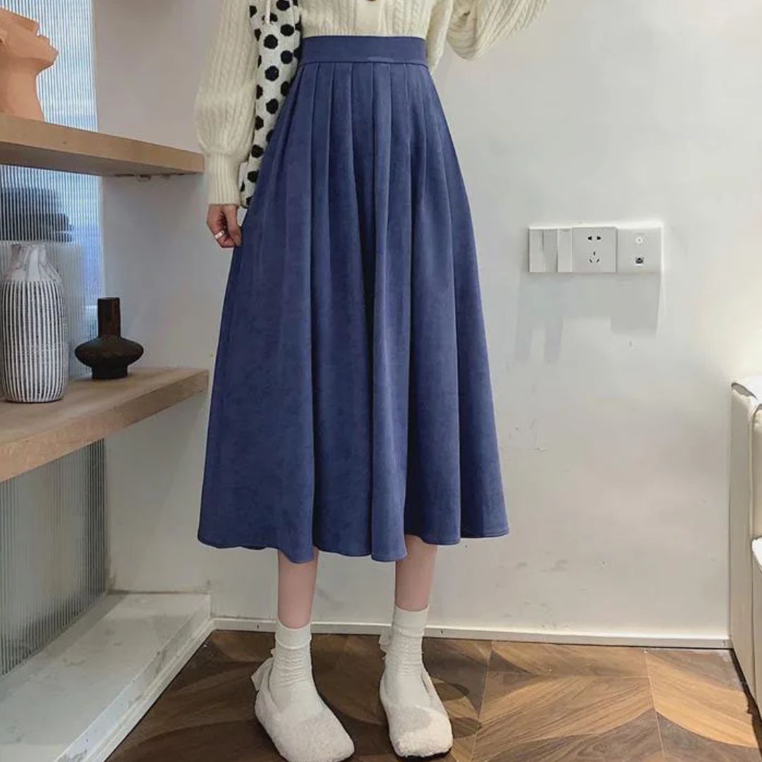 Damen Faltenrock blau, knielang, elegant, aus Baumwolle, modisch, Herbstmode, bequem.