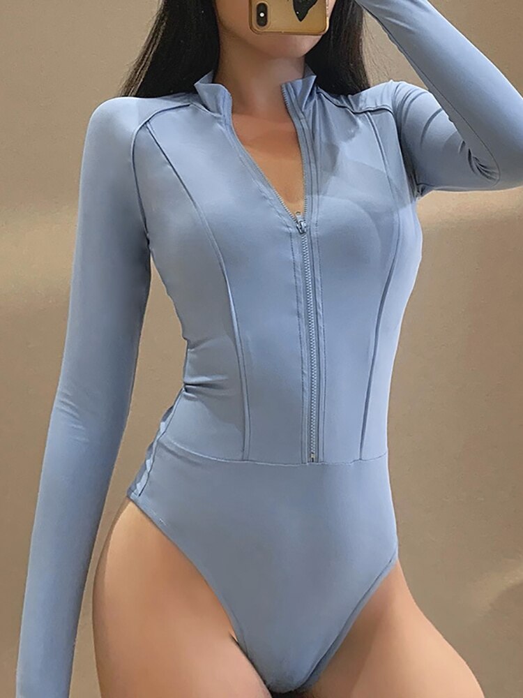 Damenbody langarm blau Reißverschluss figurbetont elegant Modebekleidung