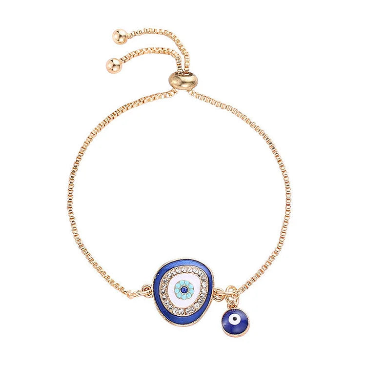 Goldenes Armband mit blauem Nazar-Amulett, verstellbar, modisches Schmuckstück für Damen.