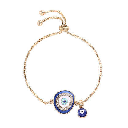 Goldenes Armband mit blauem Nazar-Amulett, verstellbar, modisches Schmuckstück für Damen.