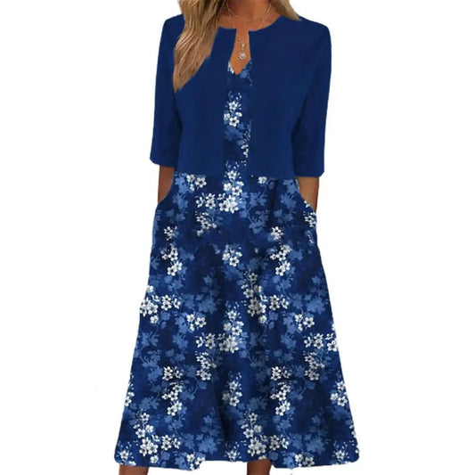 Damenkleid blau mit Blumenmuster, knielang, 3/4-Ärmel, elegantes Design, Sommermode.