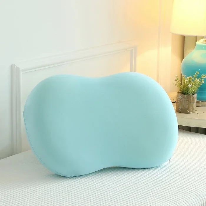 Blaues ergonomisches Kissen auf Bett, Memory-Schaum, Nackenstütze, Schlafzimmer-Dekor.