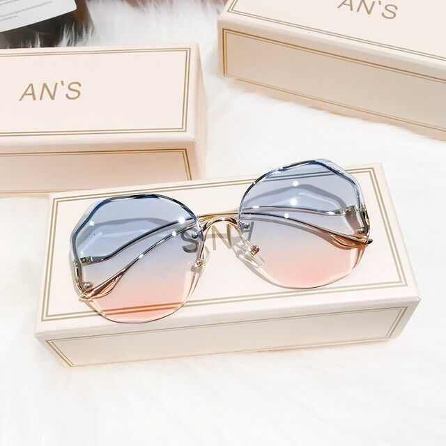 Damen Sonnenbrille blau-rosa Verlaufsgläser, modisch, luxuriös, auf weißem Hintergrund.