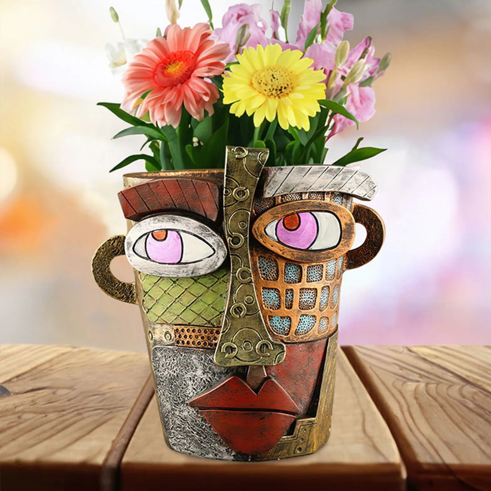 Abstrakter Blumentopf mit Gesichtsmotiv, bunt, aus Keramik, für Garten oder Geschenk.