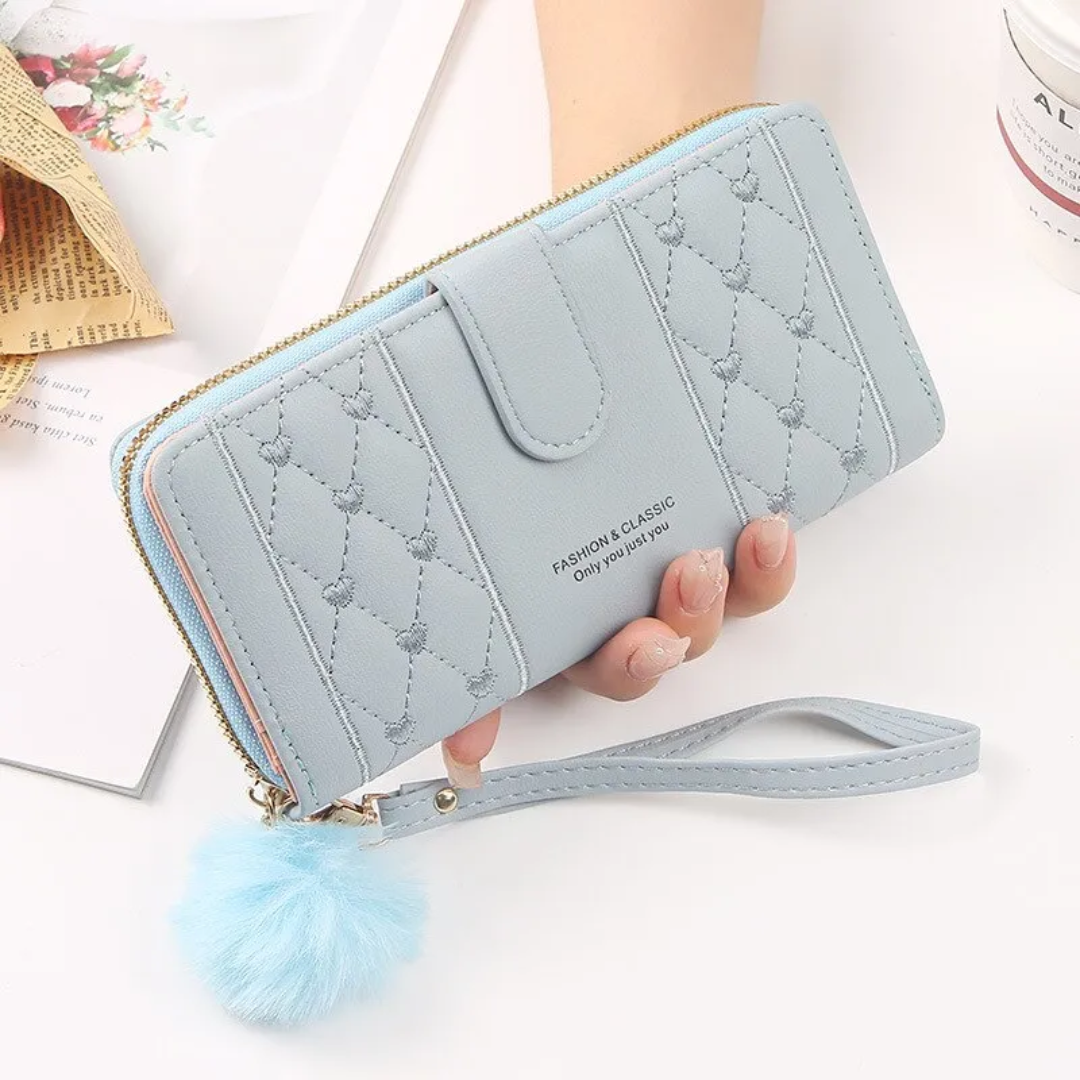 Blaue Damen-Geldbörse mit Reißverschluss, Kunstleder, Pompon-Anhänger, modisches Design.