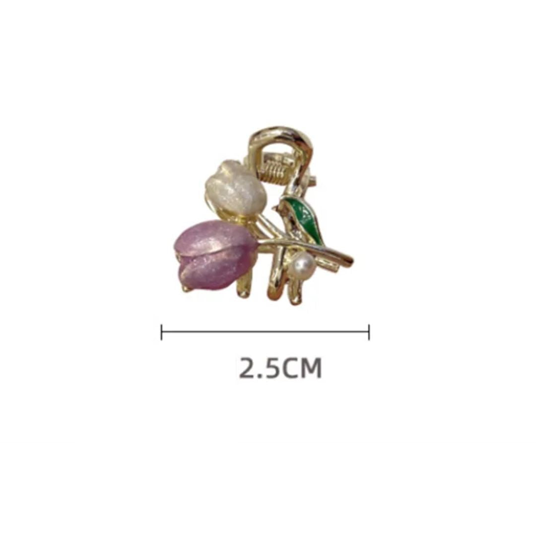 Goldene Haarspange mit lila und weißen Blumen, 2,5 cm, modisches Accessoire.