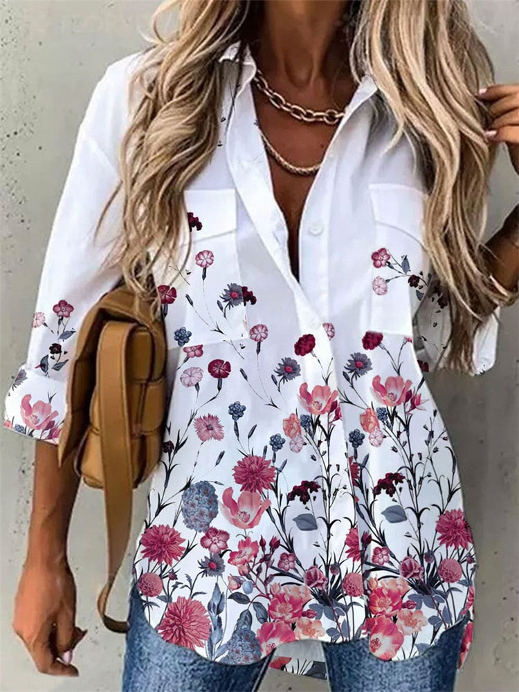 Damenbluse mit Blumenmuster, weiß, langärmelig, lässig, Baumwolle, modisch, elegant.