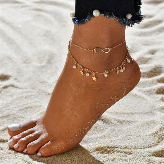 Goldene Boho-Fußkette mit Zirkonia und Perlen, Damen-Schmuck am Strand.